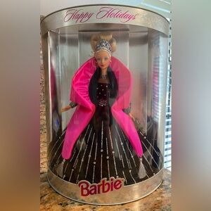 Barbie 1998 holiday edition. This Happy Holidays Barbie is perfect! Gorgeous!!!